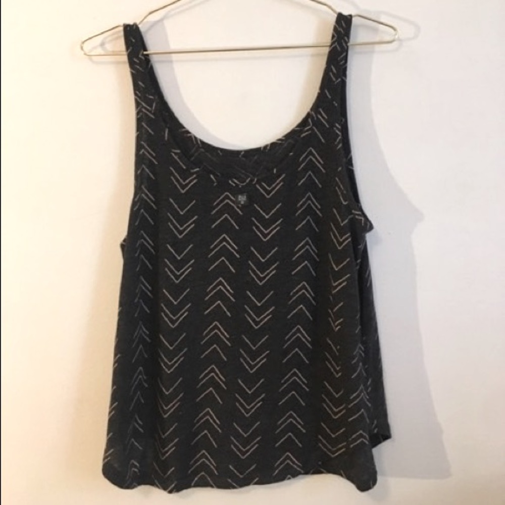 Black and white Bilibong tank top in size small.